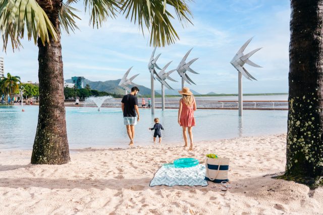 Family enjoying the Cairns Lagoon. Image via Tourism and Events Queensland