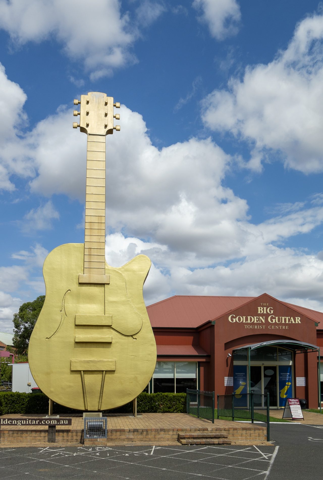 The Big Golden Guitar on display outside the Big Golden Guitar Tourist Centre in Tamworth.