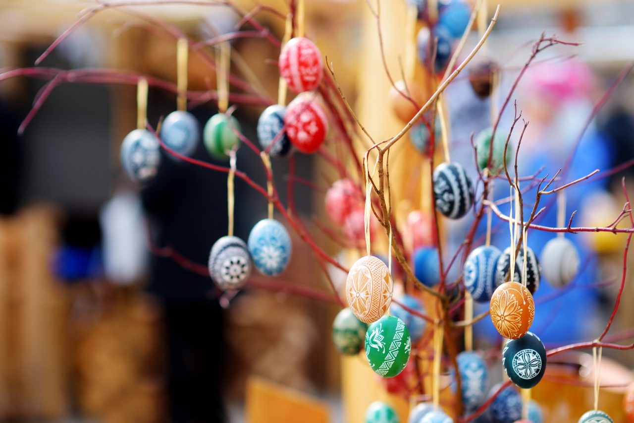 Colorful handmade wooden Easter eggs sold in annual traditional crafts fair in Vilnius, Lithuania