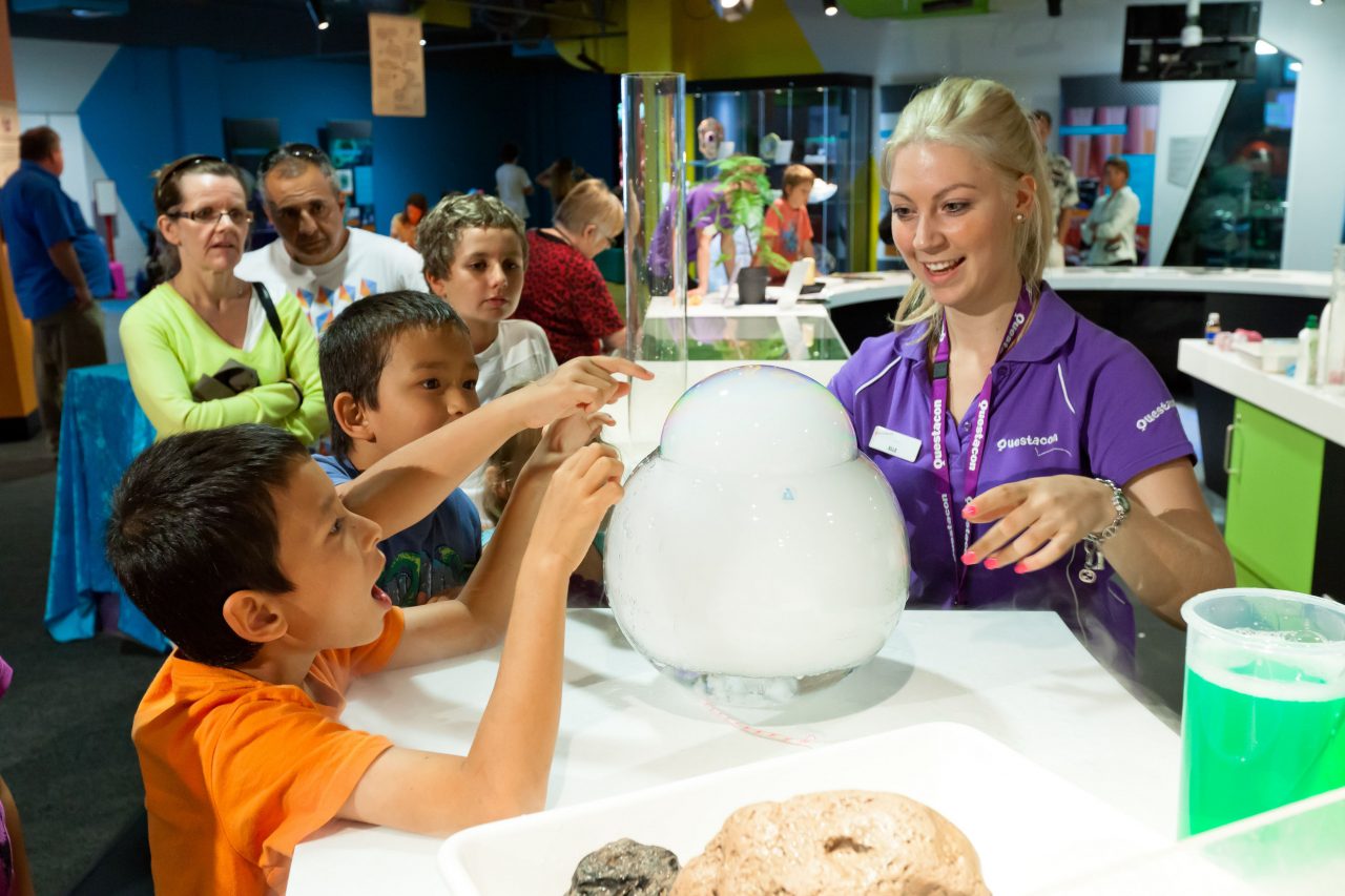 Children get involved with the experiments at Questacon